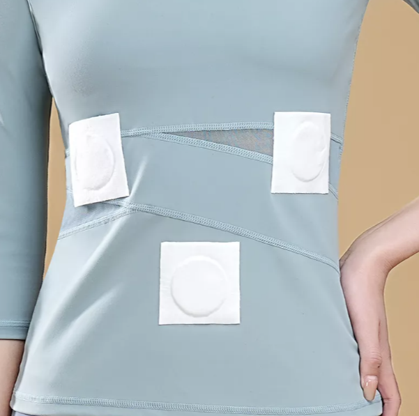 Image of a heat patch applied to the skin, providing soothing warmth for pain relief and muscle comfort.