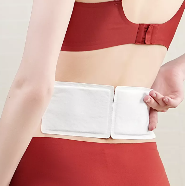 Image of heat patches placed on the skin, delivering soothing warmth for pain relief and muscle comfort.